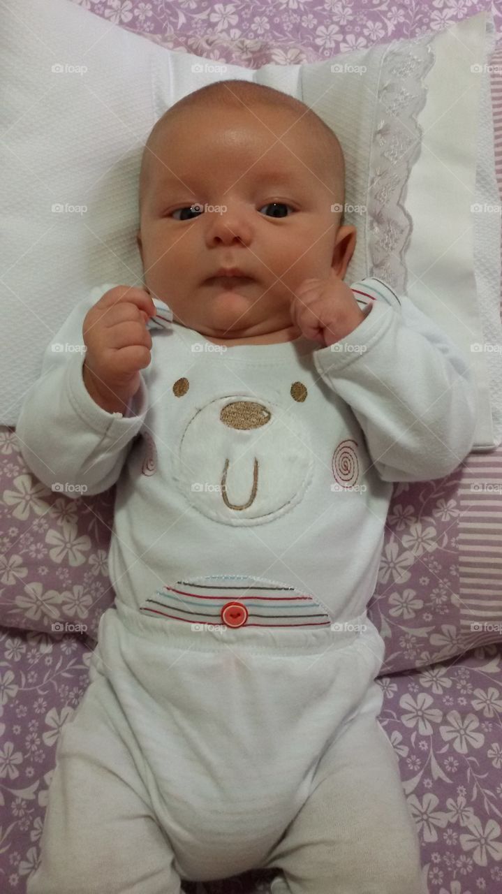 baby grimacing with hunger