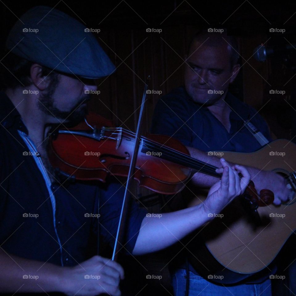 fiddler player at irish pub. O'Gilins irish pub in Lisbon
