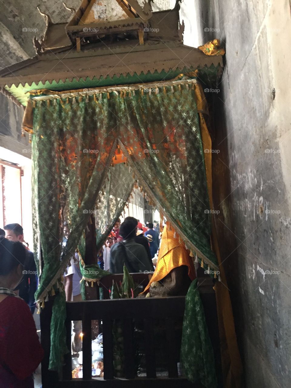 A Buddhist God that Is being prayed to today in Angkor Waat