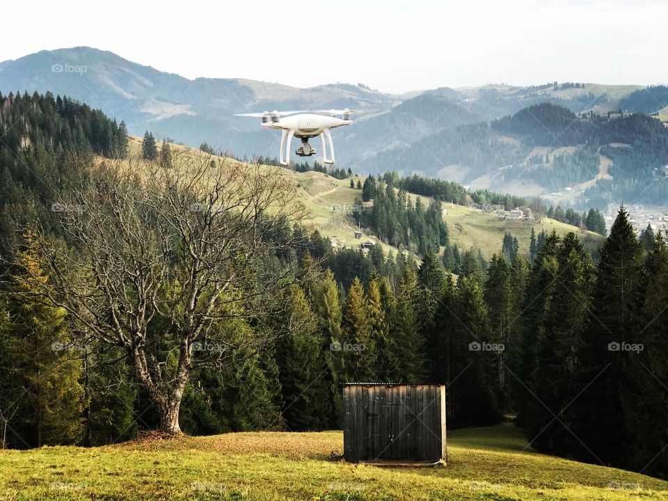 Drone flying  in the mountains 