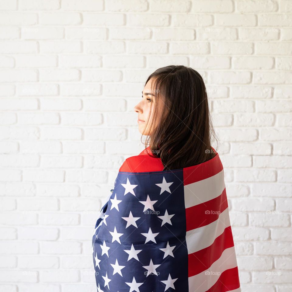 woman holding USA flag