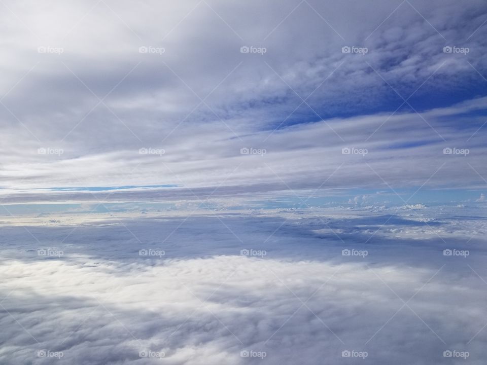 caught between the clouds