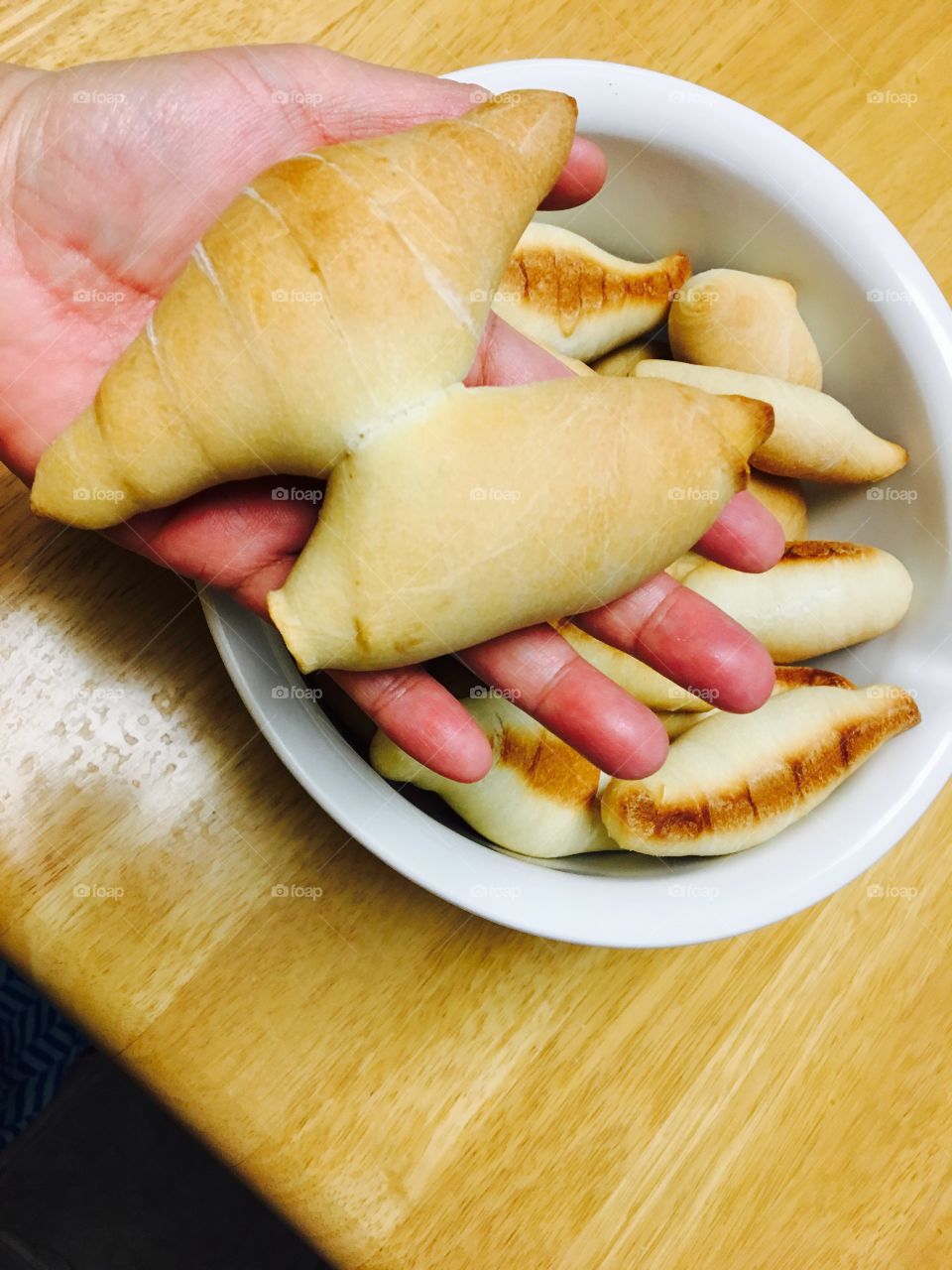 Holding home made bread