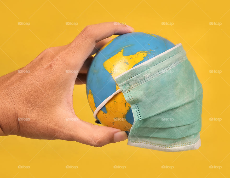 globe on hands