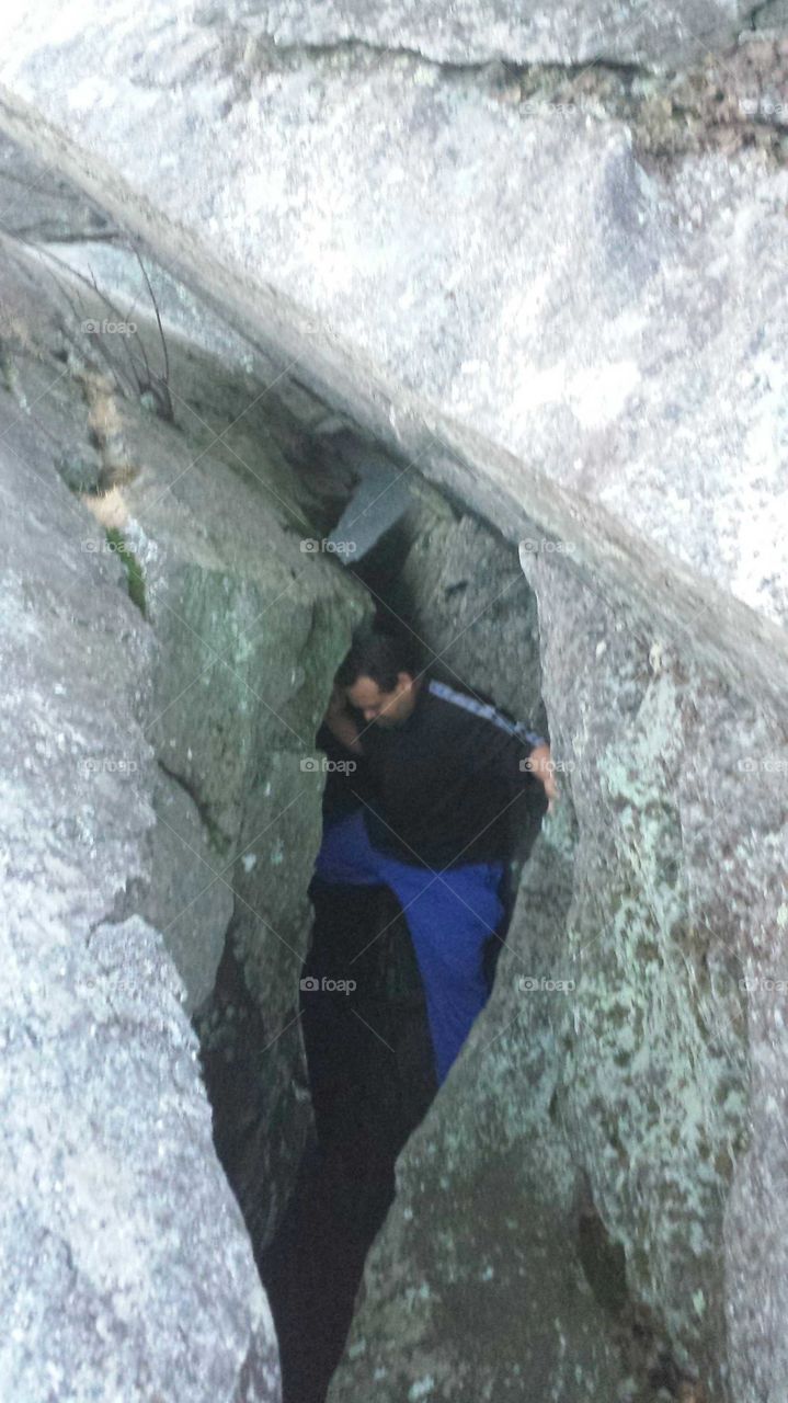 me climbing down the cave