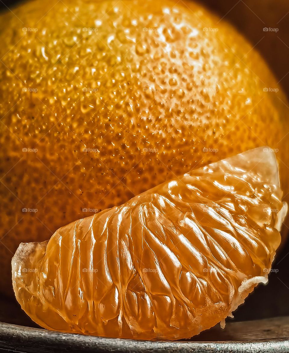 A slice of tangerine in close-up