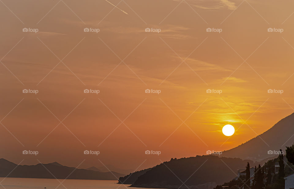 Sunset over coastline