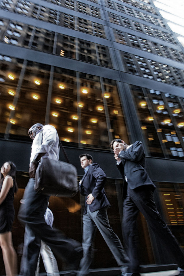 Business men in New York. I was cruising on the Wall Street and people were leaving from work
