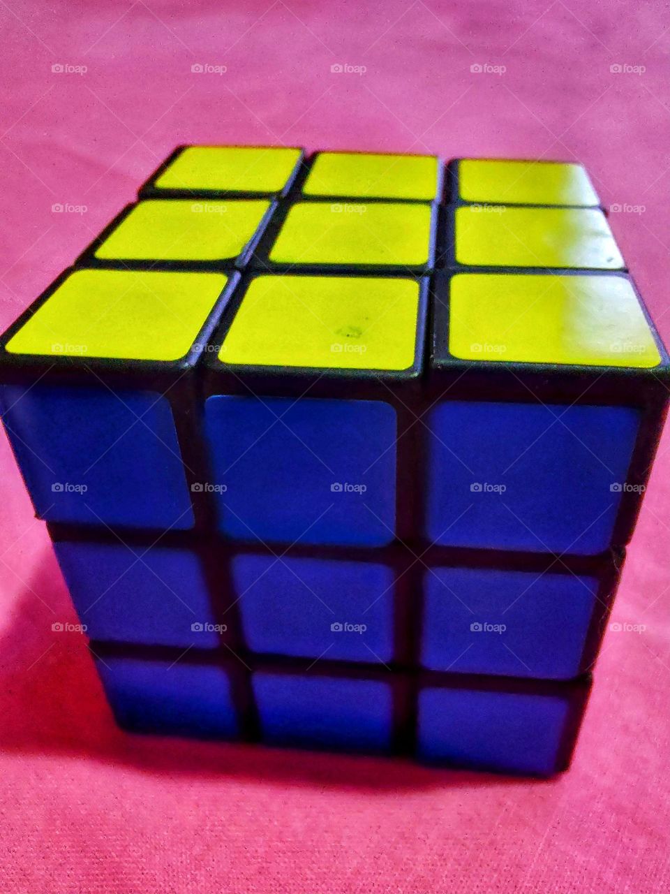 Magic cube an amazing puzzle.  Made up of several colored squares.