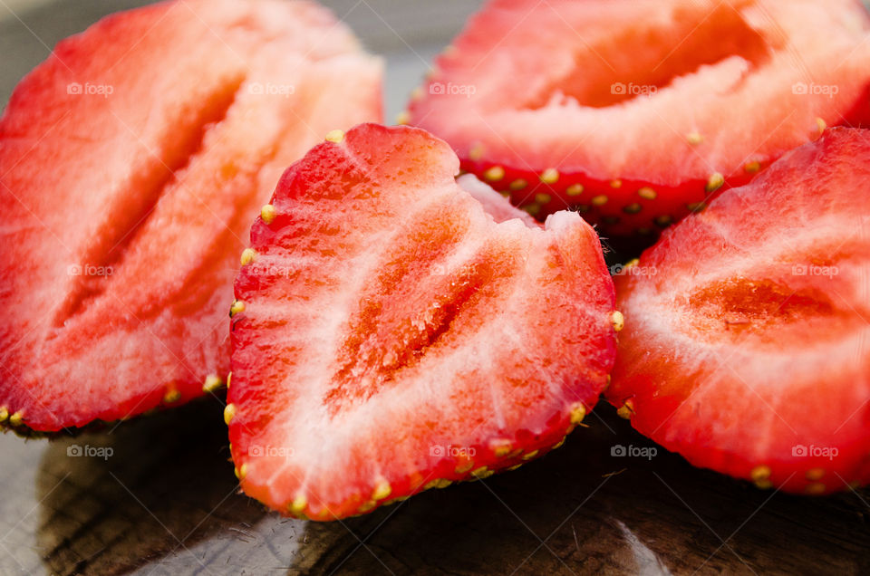 Fresh red halved strawberries