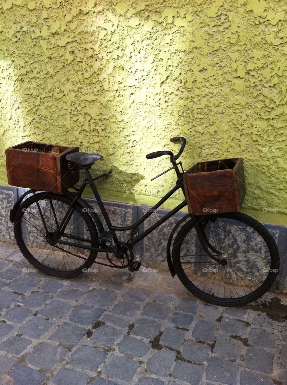 Old bicycle with wicker baskets