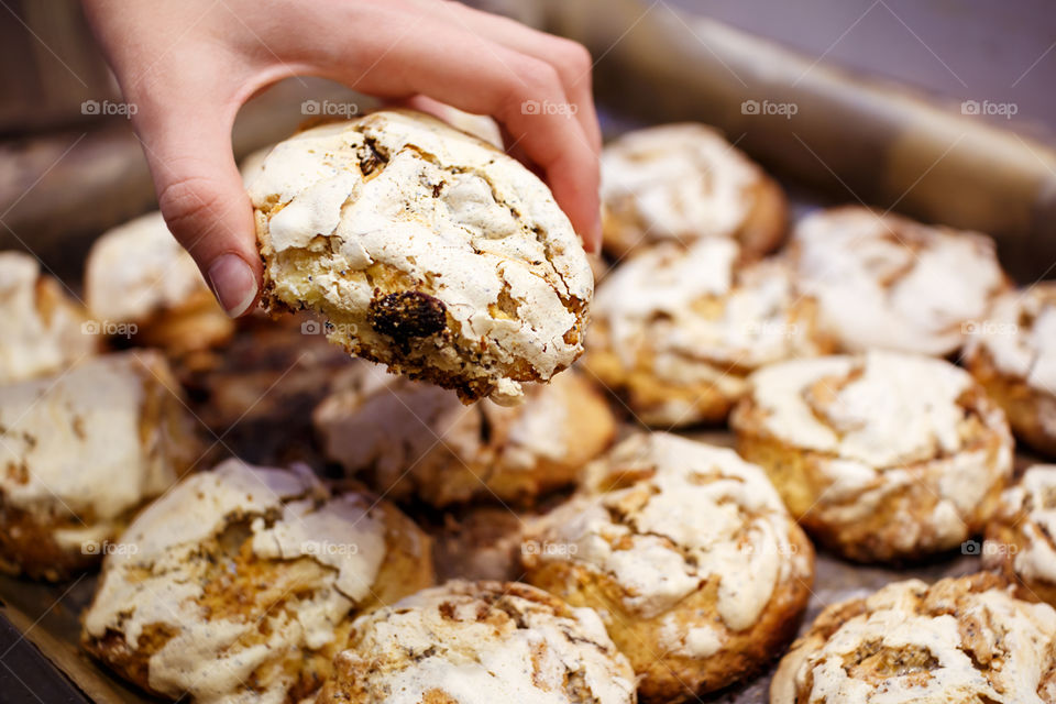 Close-up of biscuit in hand