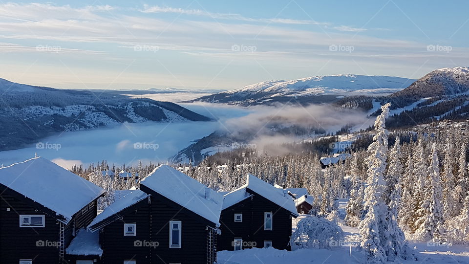 The fog is located close to the village.