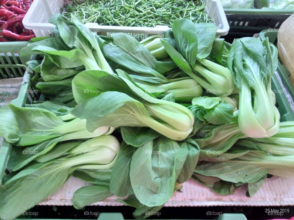Bok Choy at the wet market in Sungei Way,  Malaysia.
Fresh green leafy vegetables!.
#craftyartificer
#green
#produce
#vegetables
#color
#colours