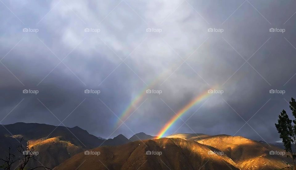 Rainbow in the mountain 