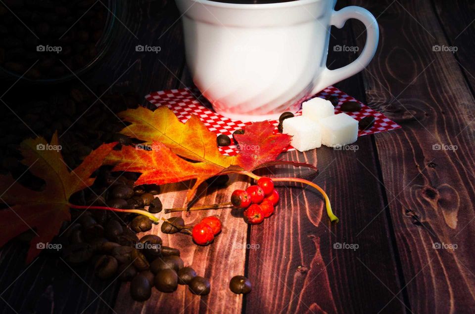 coffee been still life on wooden background