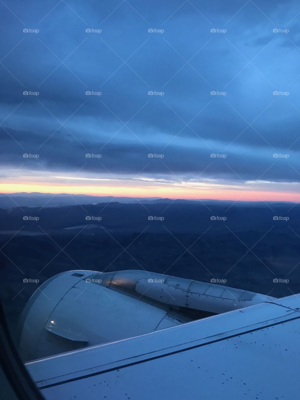 Breath taking image of the sunset from our airplane seat. You loose yourself in such beauty!