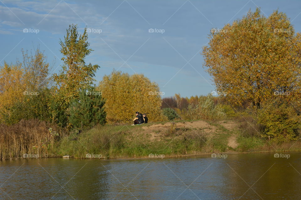 lake beautiful nature landscape and family resting autumn time blue sky background, no filters