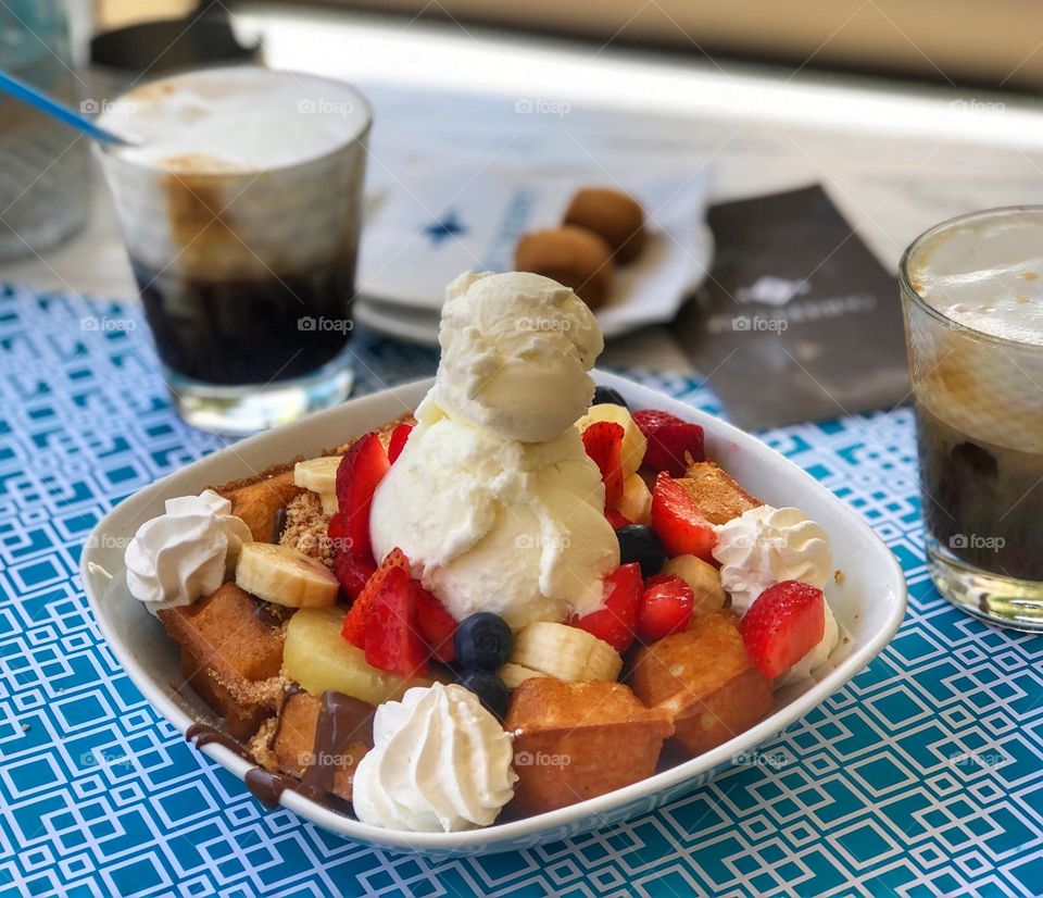 Fresh fruit waffles with an ice cream snowman. Brunch, coffee, fruit, icecream, snowman