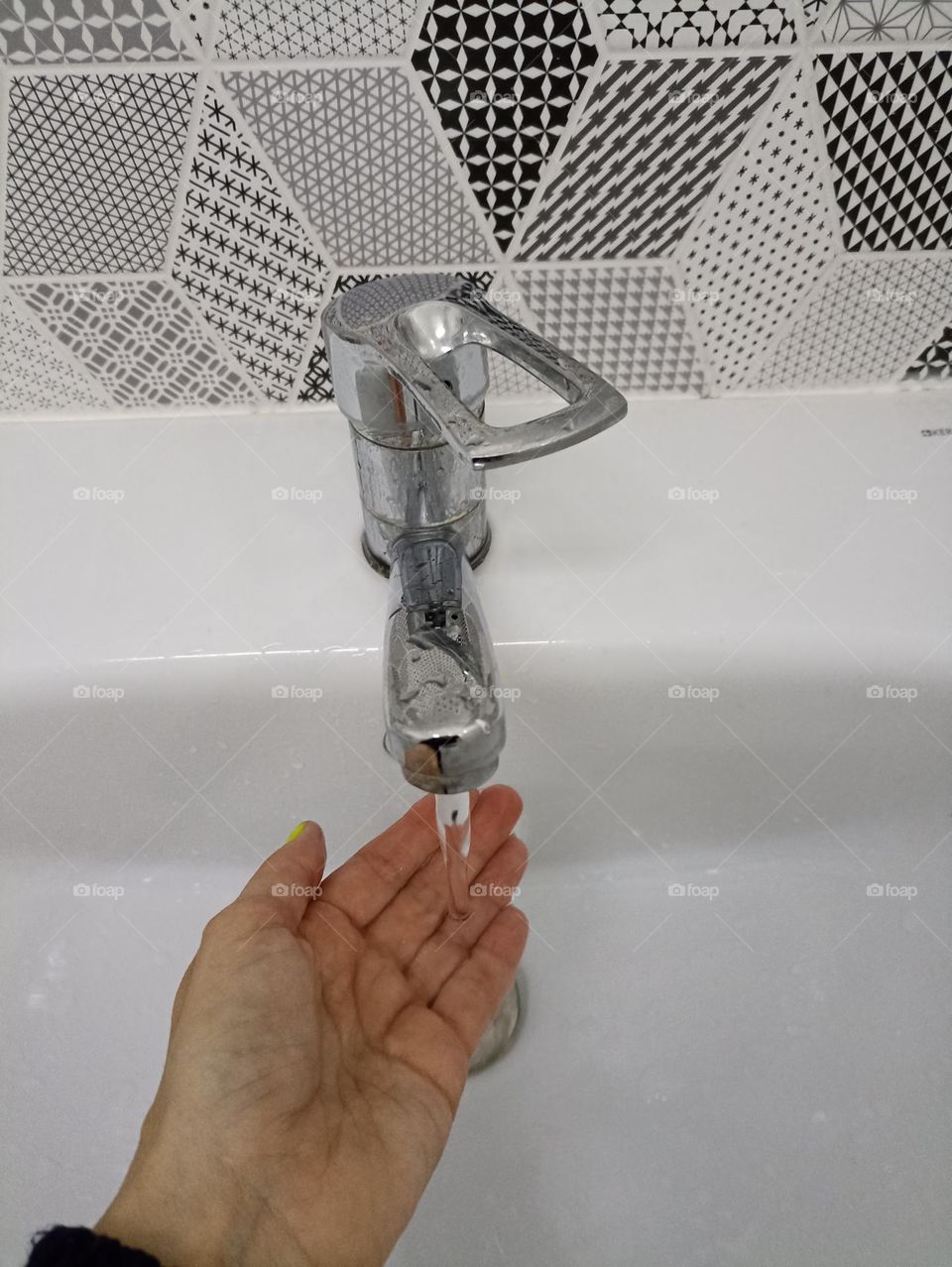 water and hand person