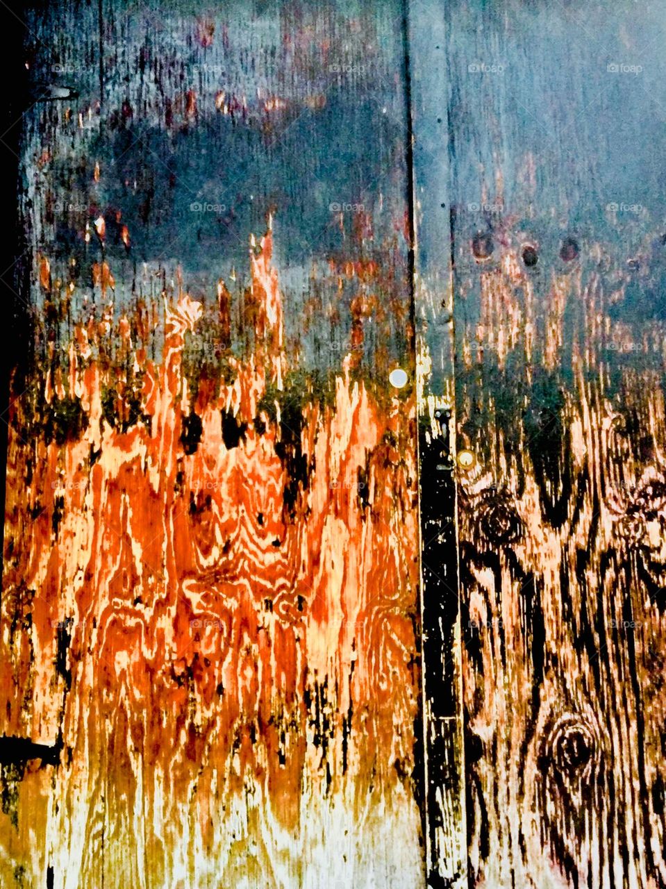 A dramatic looking wood grain on an old door near “Vernon Jackson Ave” in LIC, Queens can open up a completely unexpected dimension. It begins to reveal patterns resemble flames. 2019. Hypnotic Productions