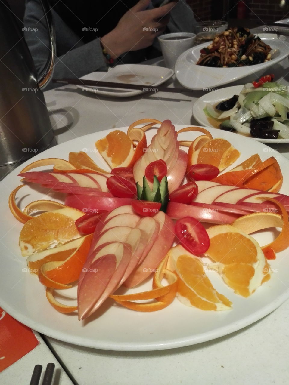 I think people know what it is . but it looks like flowers with rich colors. In China, we use the various kinds of fruits to combine it as flowers that give people good appetite.