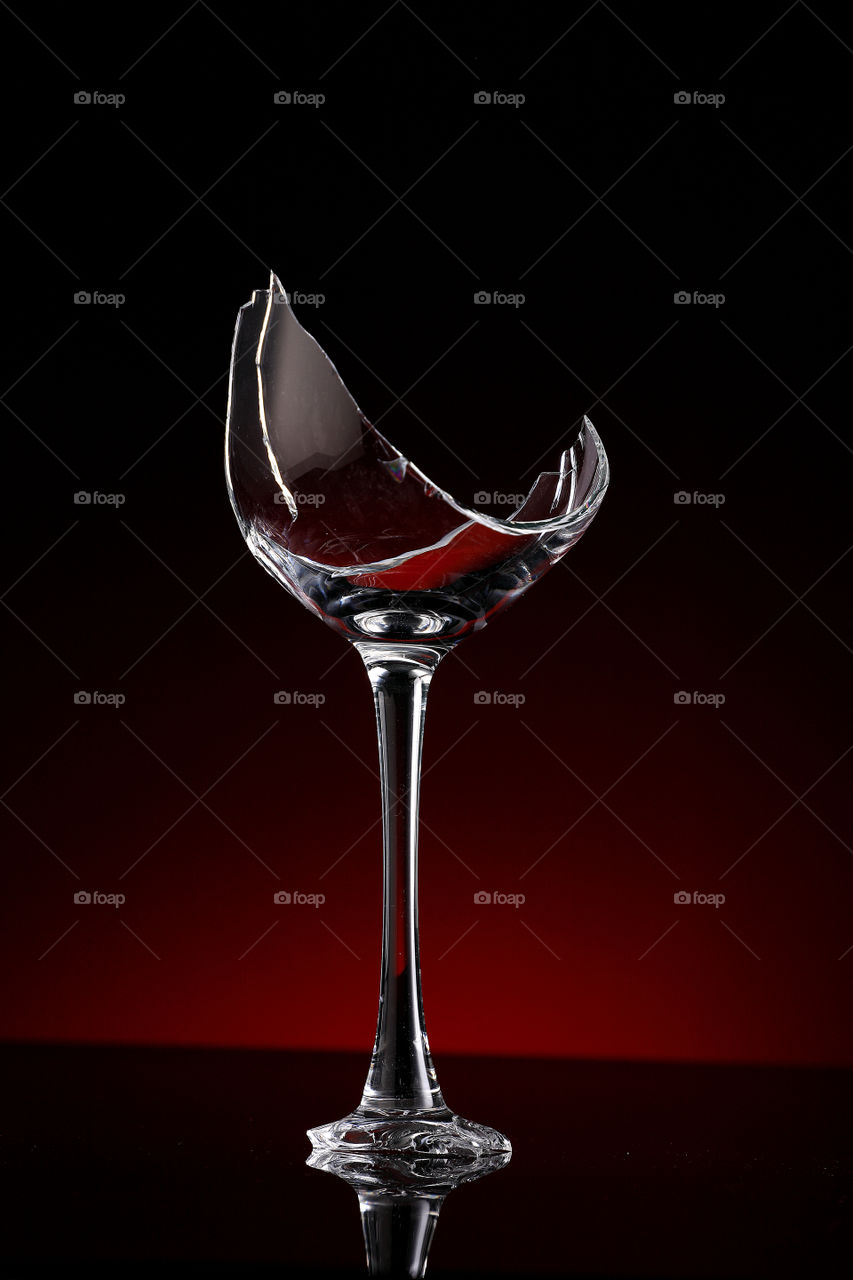 Abstract broken wine glass