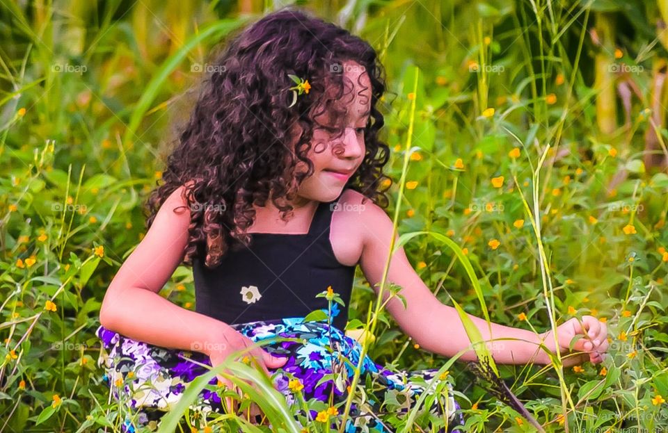 Girl in flower field