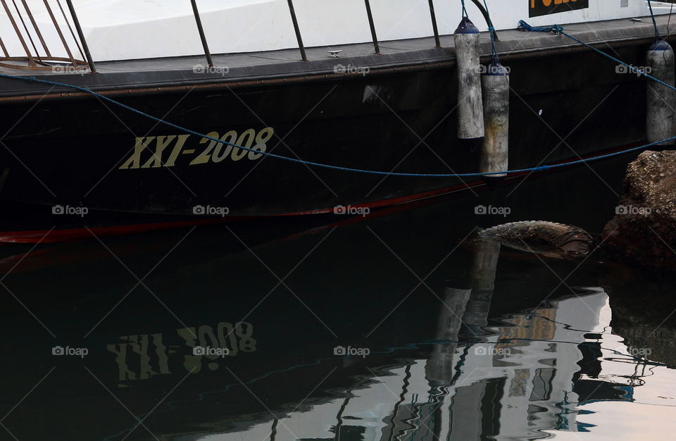 Reflection of XXI - 2008 at the corner site of harbour. Still be rest to the long of time and looking for good , XXI - 2008