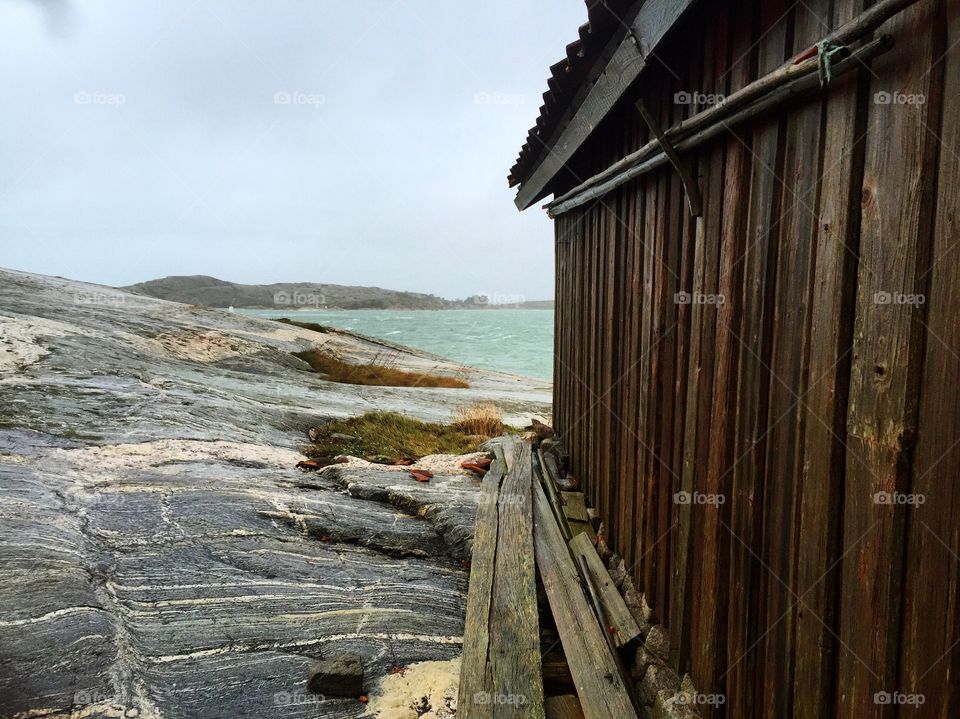 Scenics view of house near by sea