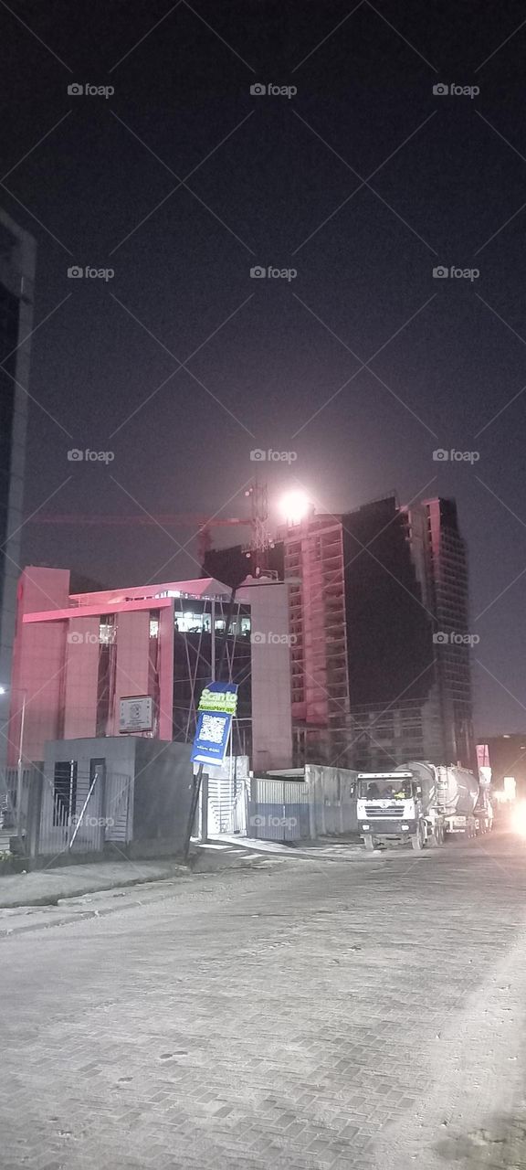 Twinkling windows , the beauty of evening light. Bask in the beauty of evening light with the view of light twinkling from these windows at night