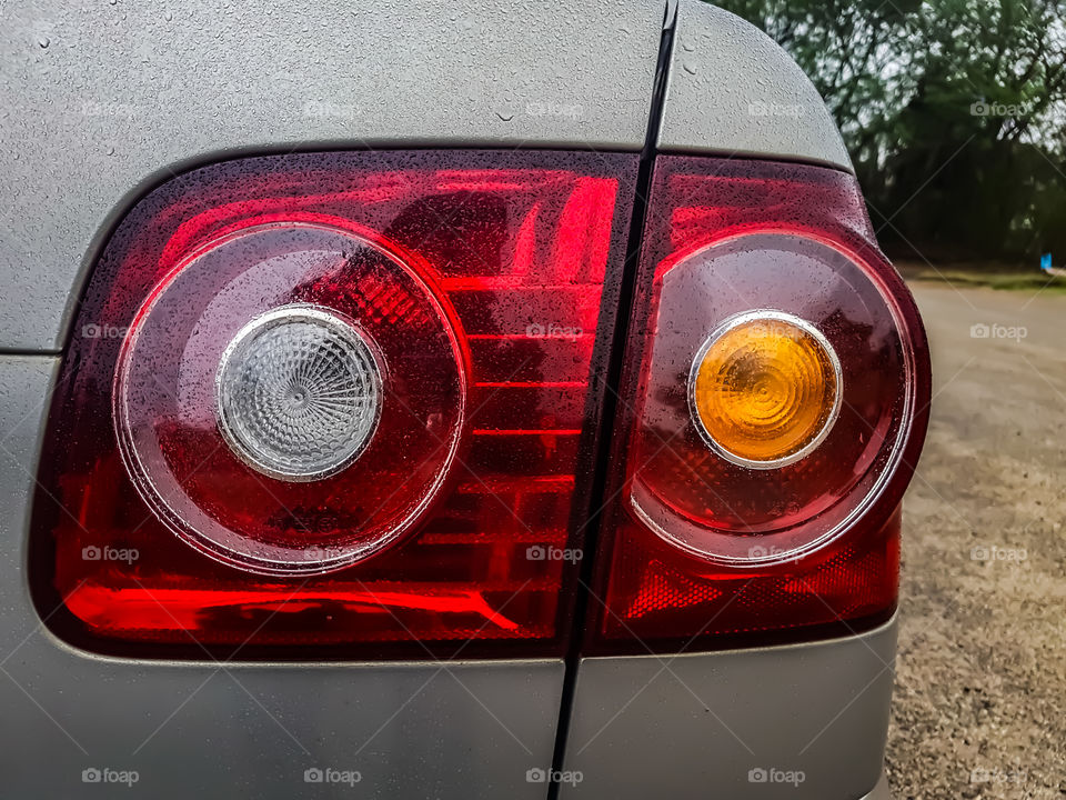 rear lights of a car in the rain