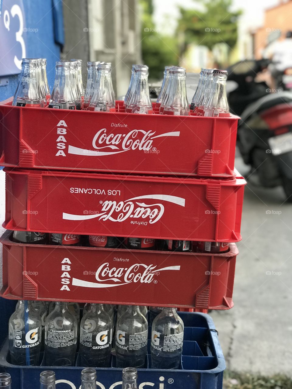 Empty Coca Cola bottles refresh the spirit