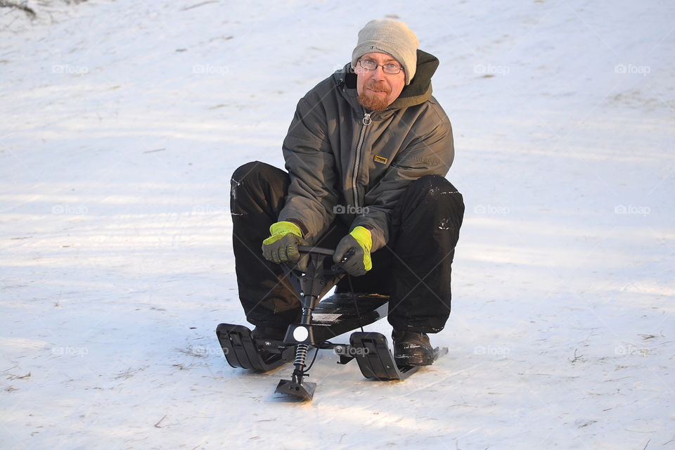 Man sledding