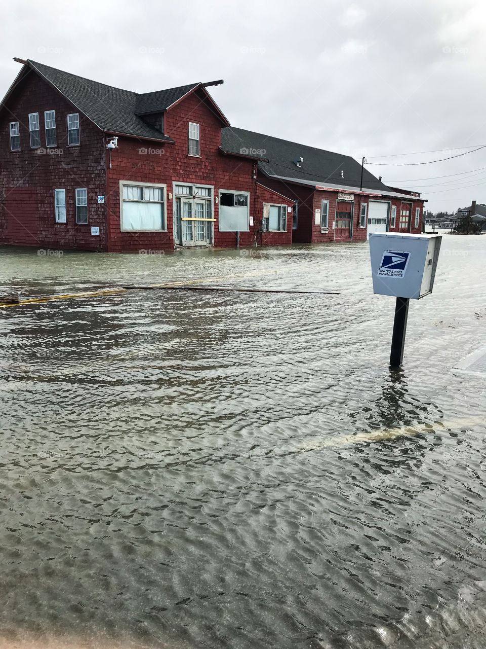 Ocean flooding destroy boat shop