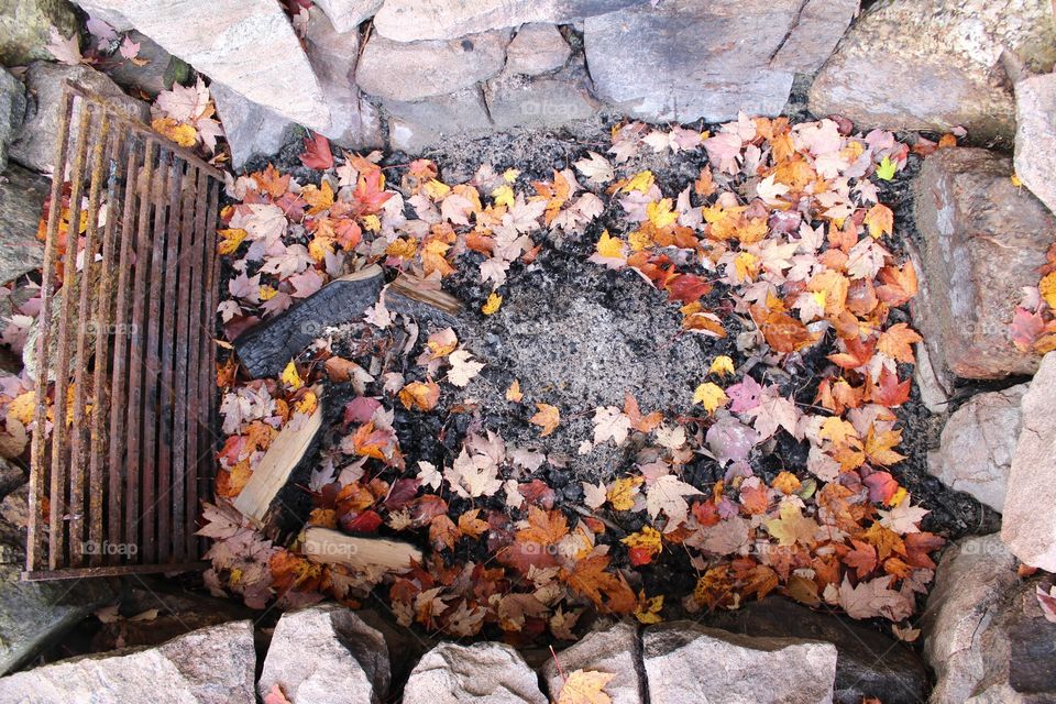 Empty fire pit in autumn