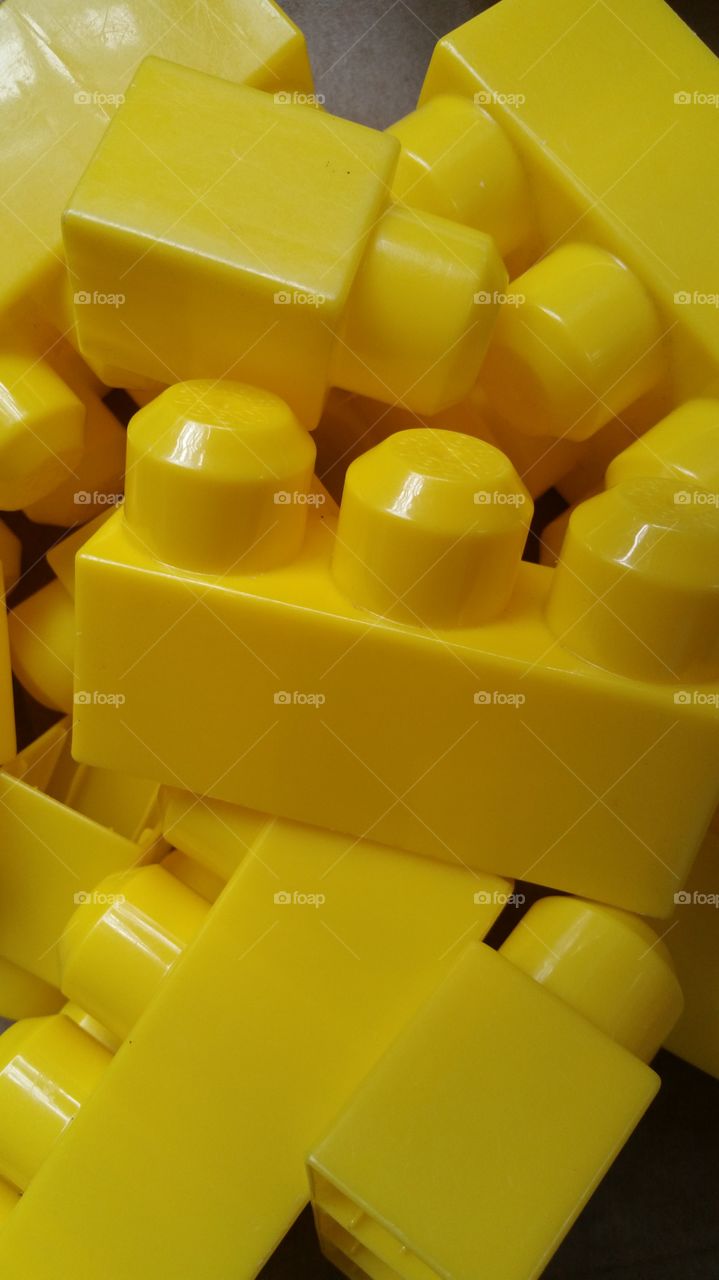 Toy yellow building blocks
