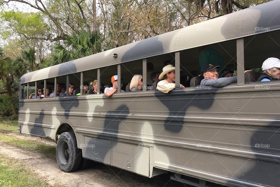 People commuting by bus.