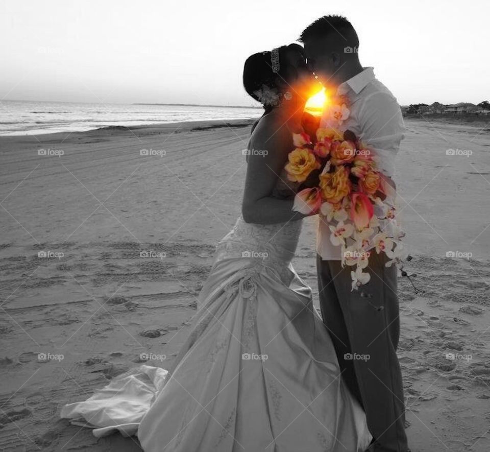 We said our vows by the ocean as the sun slowly set on one of the best days of my life. 