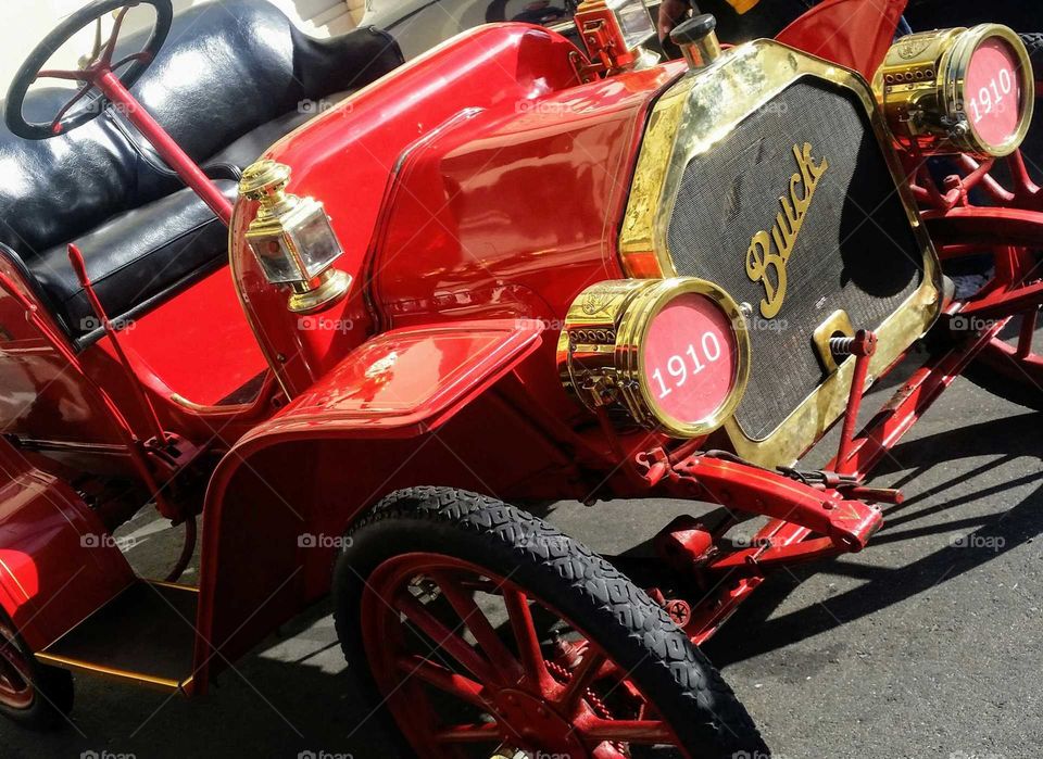 red antique old car 1910