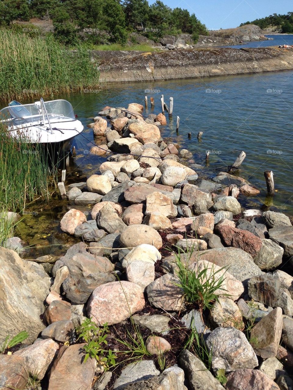 sweden water boat rocks by anetteaventyr