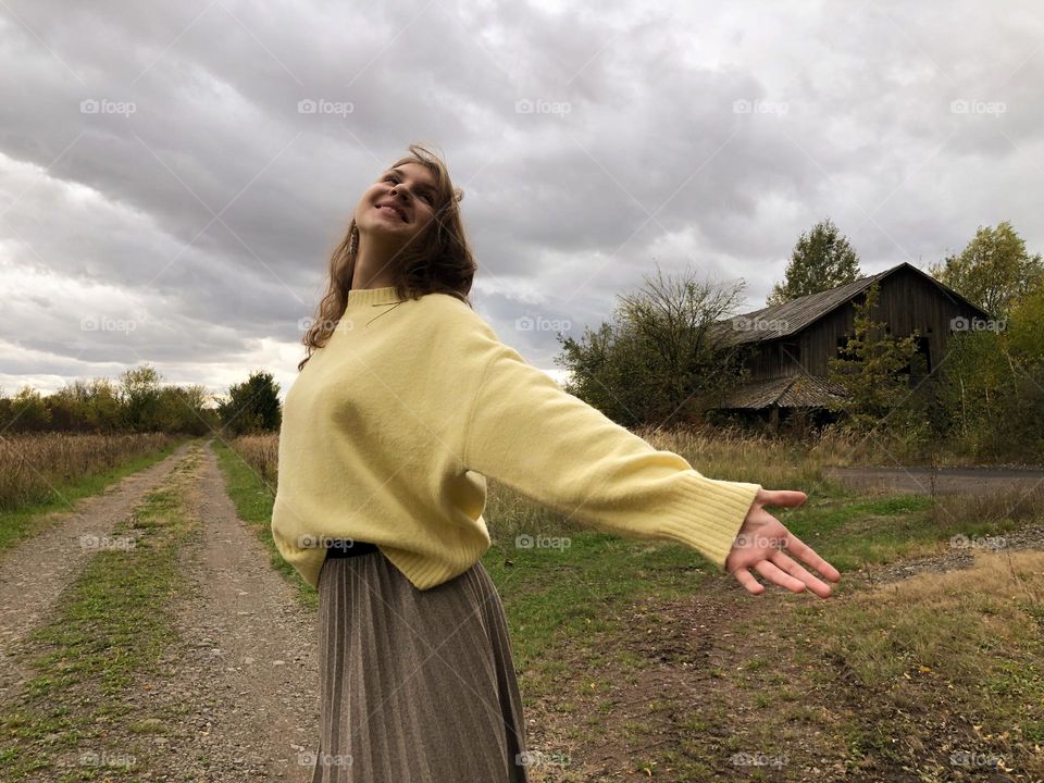 Girl under the rain clouds 