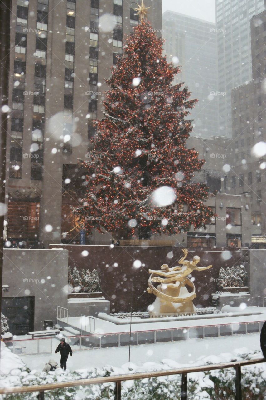 snow falling at Rockefeller Center NYC