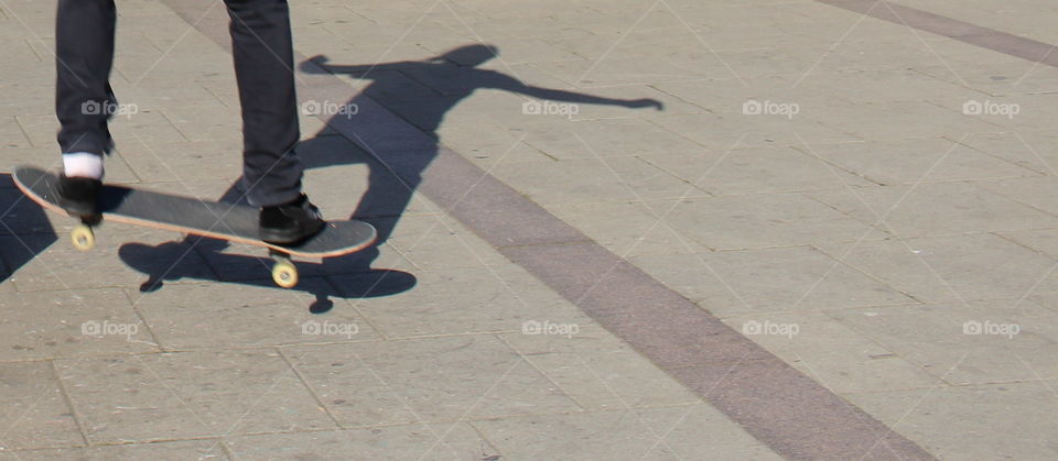 Shadow of a skateboarder.. Shadow of a skateboarder.