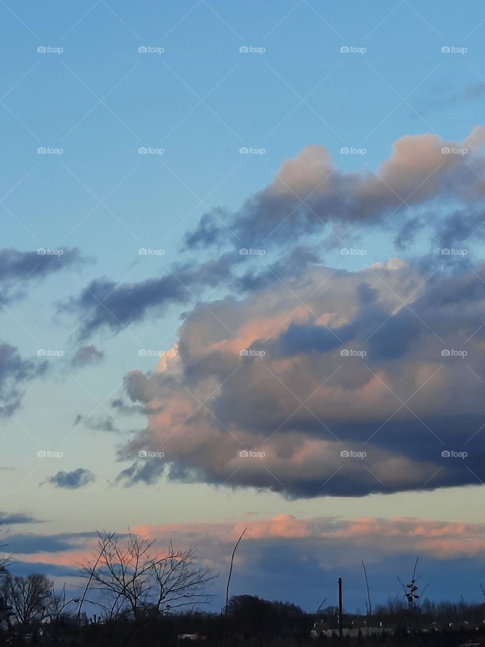 sky at sunset with multicolor  clouds and blue sky