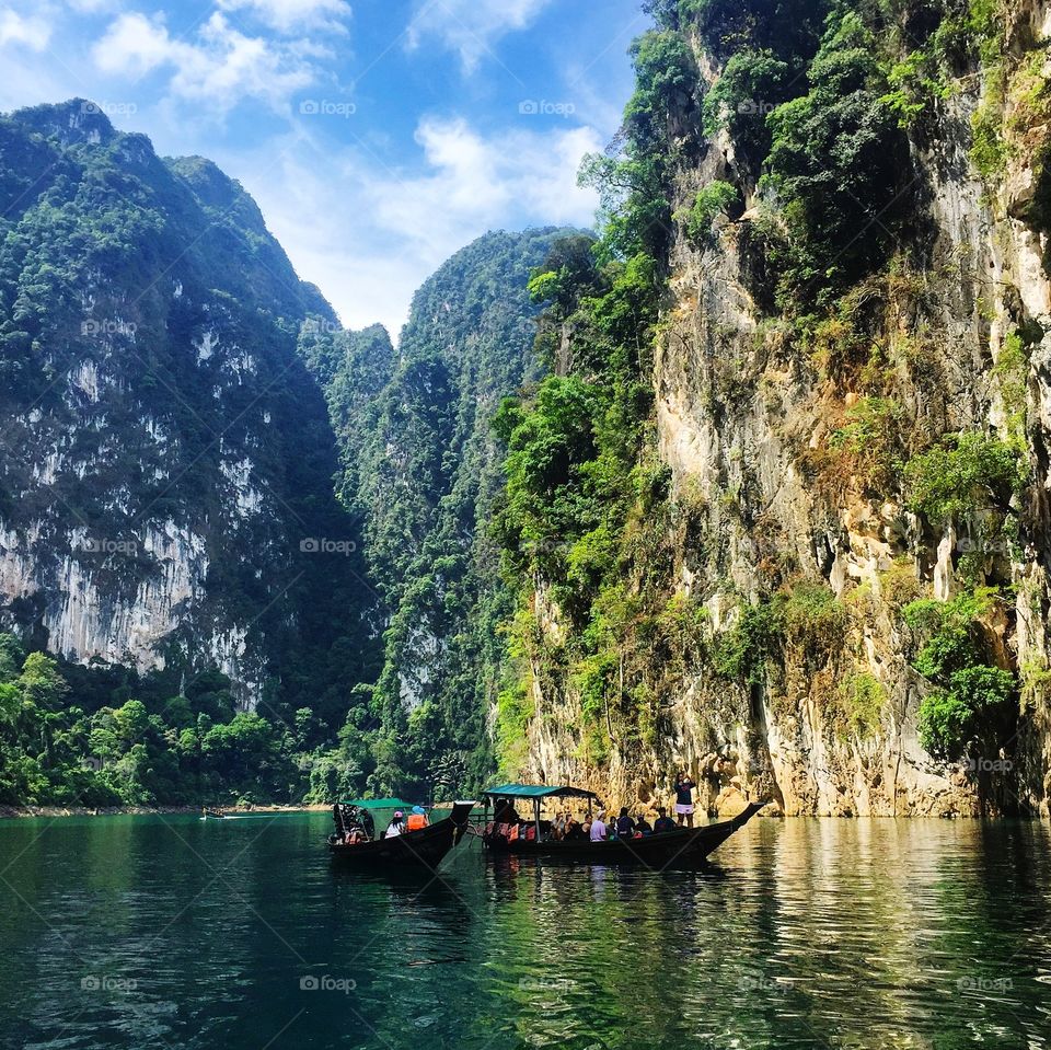 Scenic view of lake against limestone mountains