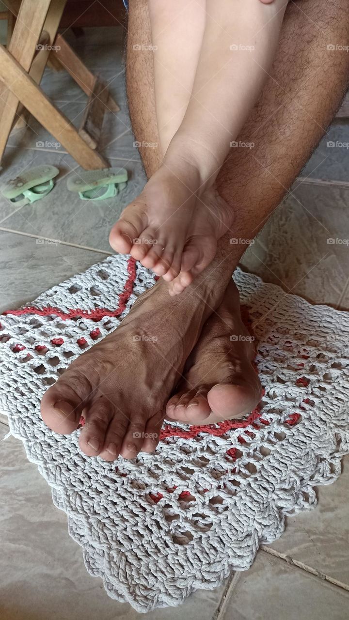 Bare feet in pairs