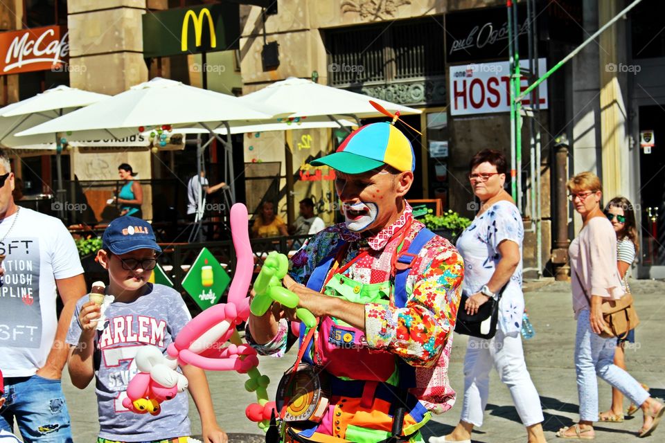 Cheerful balloon seller