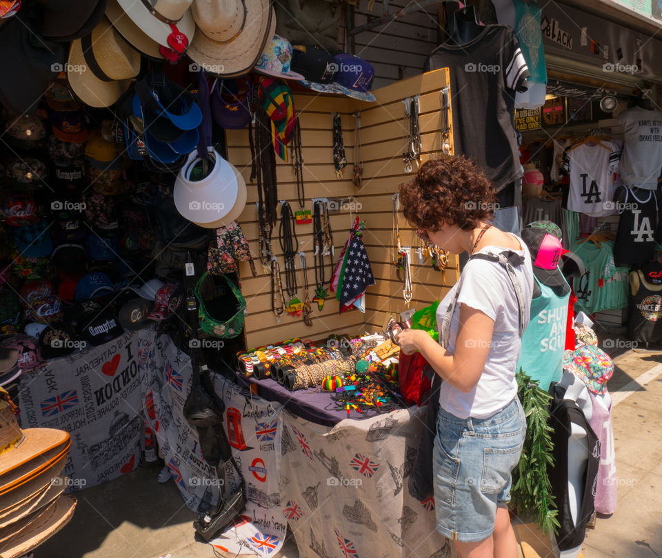 Beautiful girl shopping at Venice Beach