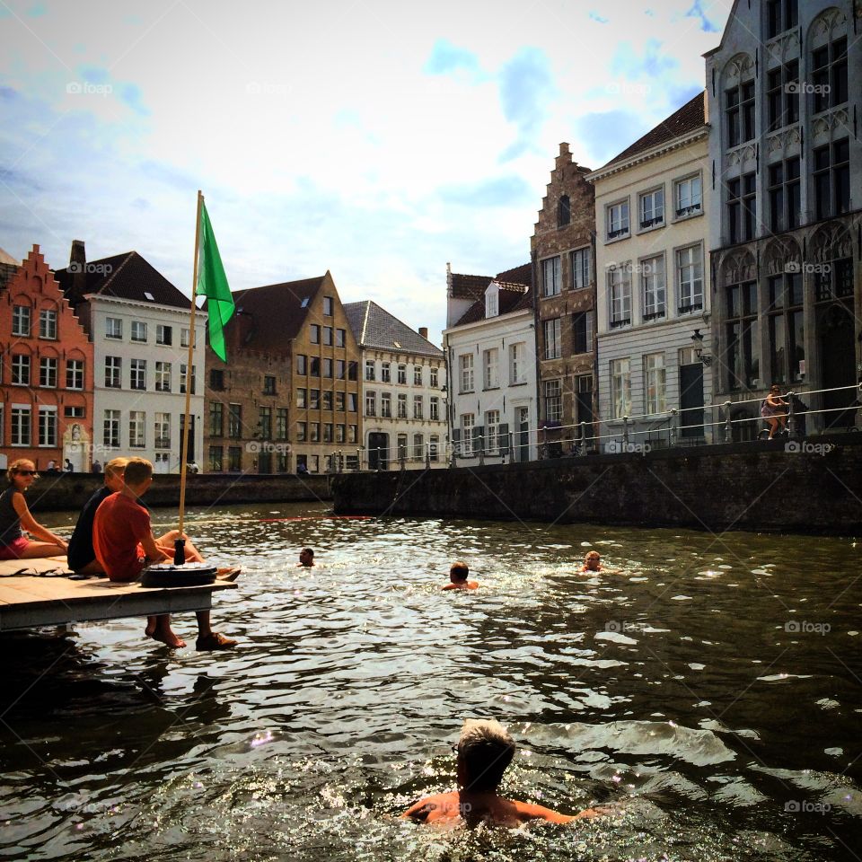 Canal swimming in Bruges, Belgium